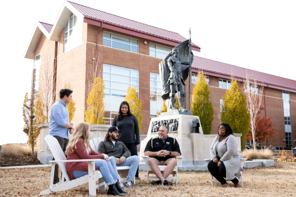 Longwood University graduate students on the lawn.