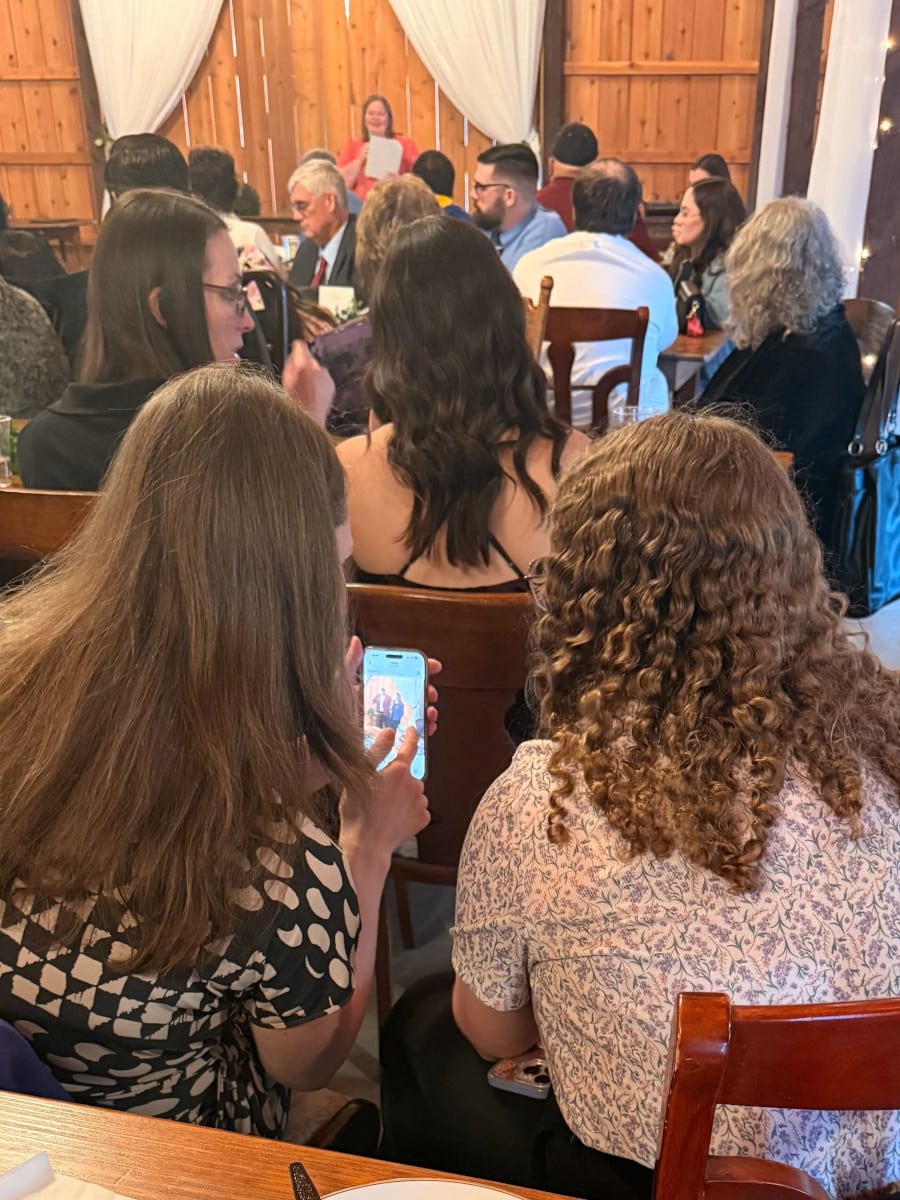 Letterpress Communications team looks at cell phone photography settings on an iphone.