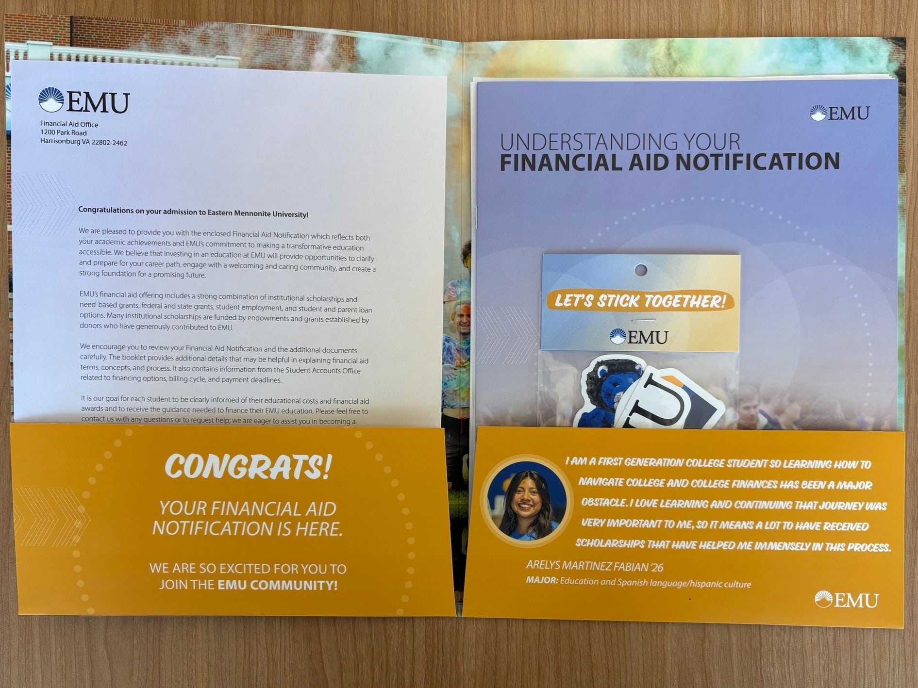 Folder with letters, stickers and other information for the Eastern Mennonite University financial aid notification packet.