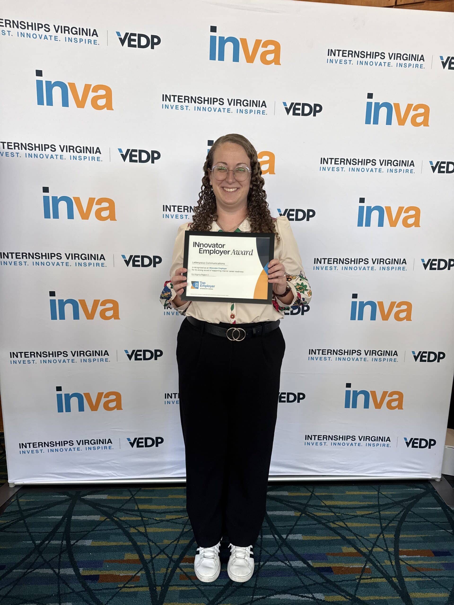 Letterpress Communications Social Media Manager Karyn Keane accepts the Internships Virginia Innovator Employer Award on Oct. 1, 2026 at the Virginia Chamber of Commerce’s Virginia Education and Workforce Conference in Richmond, Va.